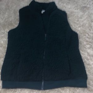 green fur vest